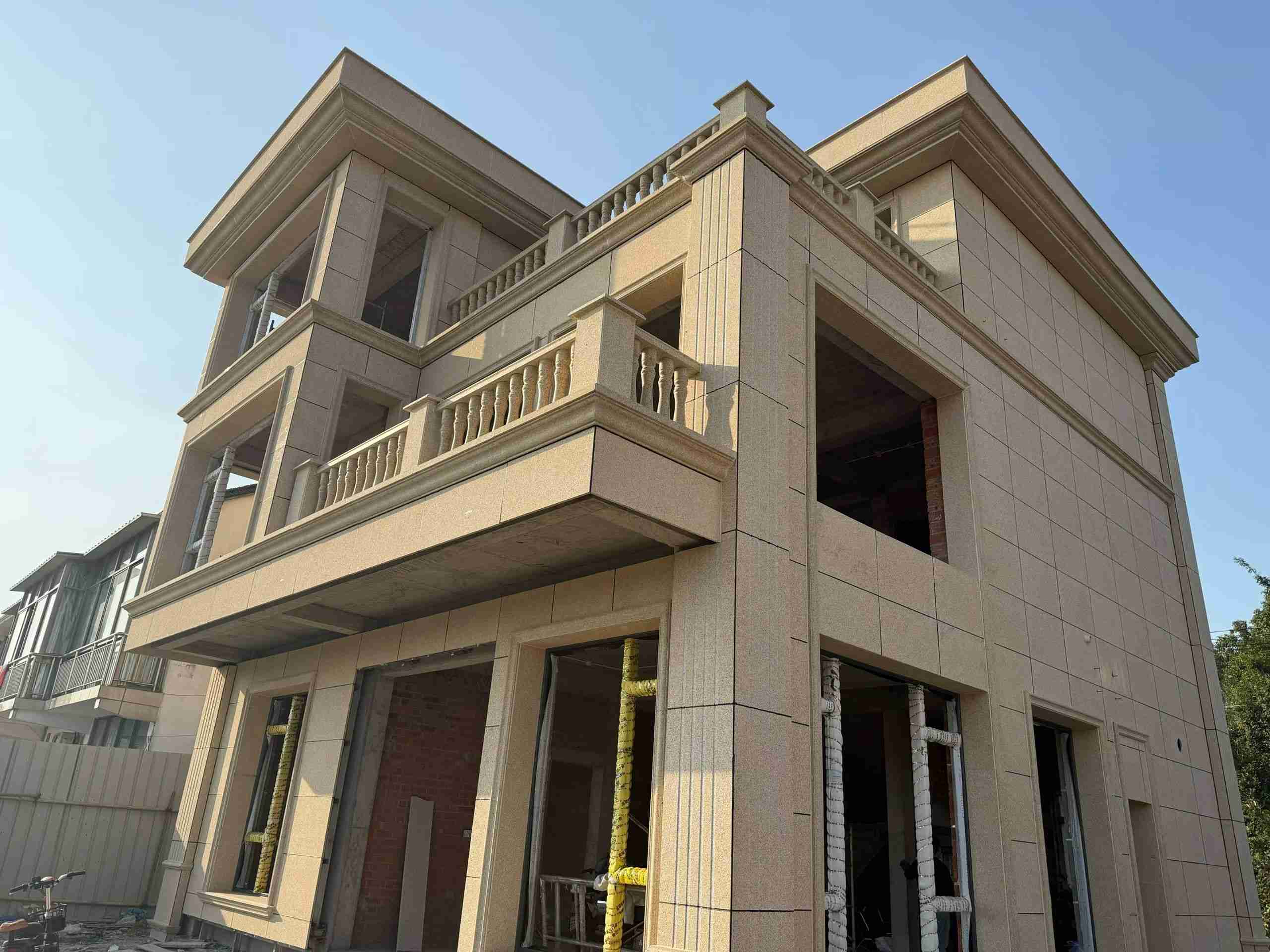 福州 黄金麻花岗岩石材荔枝面外墙干挂效果展示